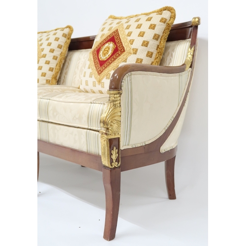 2107 - A CONTEMPORARY LOUIS XVI STYLE THREE SEATER SETTEE with cream Damask upholstery on shaped frame with... 