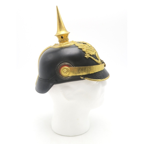 2608 - AN IMPERIAL GERMAN PRUSSIAN OFFICER'S PICKELHAUBE&nbsp;Fitted with a tall spike, the base having sta... 