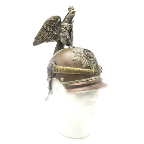 2610 - A REPRODUCTION IMPERIAL GERMAN PRUSSIAN GARDE DU CORPS PARADE HELMETThe tombak body with rivetted lo... 