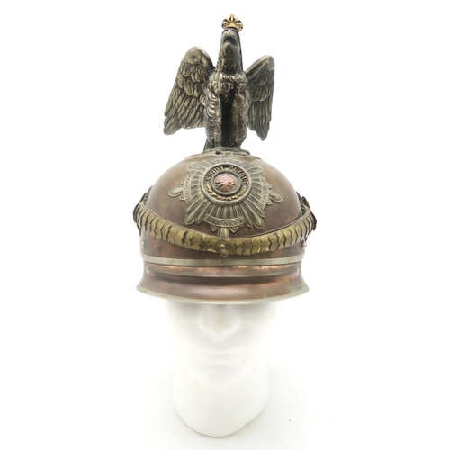 2610 - A REPRODUCTION IMPERIAL GERMAN PRUSSIAN GARDE DU CORPS PARADE HELMETThe tombak body with rivetted lo... 