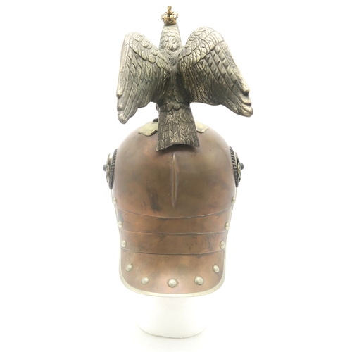 2610 - A REPRODUCTION IMPERIAL GERMAN PRUSSIAN GARDE DU CORPS PARADE HELMETThe tombak body with rivetted lo... 