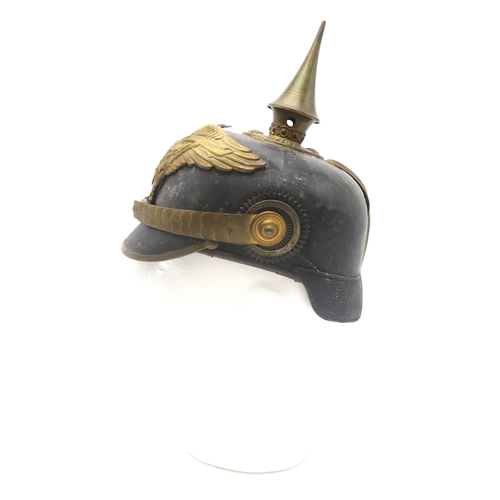 2611 - AN IMPERIAL GERMAN PRUSSIAN OFFICER'S PICKELHAUBEWith scaled chinstrap, the spike having star fittin... 
