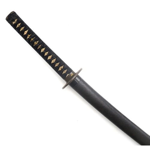 2612 - A JAPANESE KATANAThe smith-made blade with Midare Hamon and measuring approx. 74cm in length, the ta... 