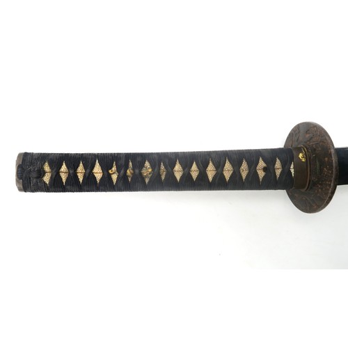 2612 - A JAPANESE KATANAThe smith-made blade with Midare Hamon and measuring approx. 74cm in length, the ta... 