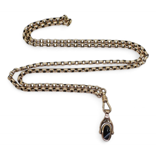 703 - A 9ct gold guard chain with 9ct gold mother of pearl and onyx swivel fob, hallmarked 9ctto the clasp... 