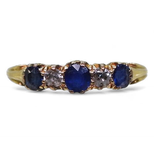 707 - A yellow metal sapphire and diamond ring, the shank stamped '18' with inscription dated 1906, size O... 