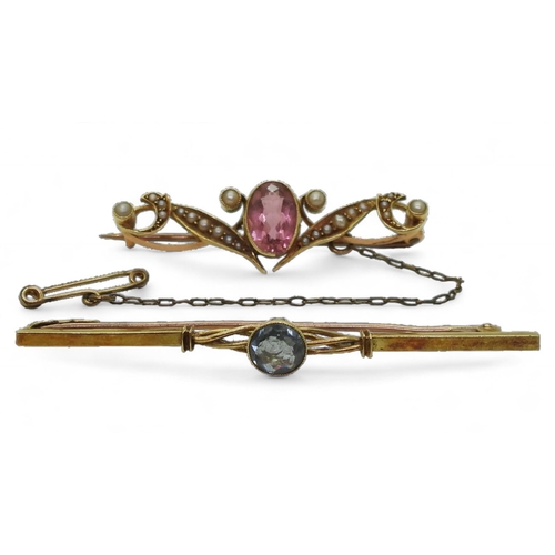 715 - A 15ct gold brooch set with pink tourmaline and pearls, together with a 15ct gold aquamarine brooch,... 