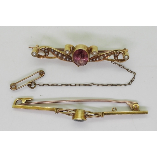 715 - A 15ct gold brooch set with pink tourmaline and pearls, together with a 15ct gold aquamarine brooch,... 