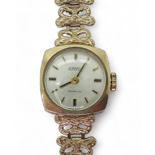 731 - A 9ct gold Roamer ladies watch and strap, weight including mechanism 11.4gms