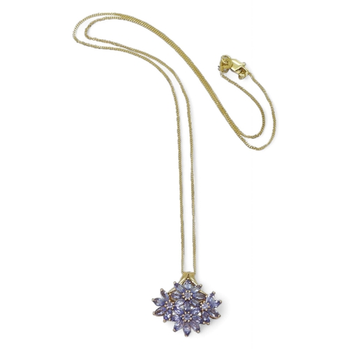 733 - A 9ct gold blue gem flower pendant and 45cm chain, 3.4gms