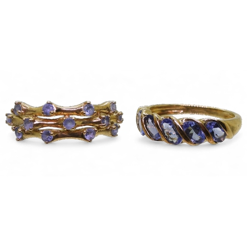 737 - A 9ct gold tanzanite linear cluster ring, size K1/2, together with a 9ct gold tanzanite five stone r... 