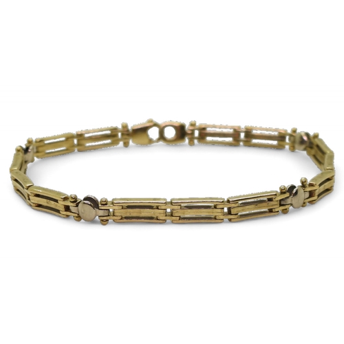 738 - A 9ct white and yellow gold decorative bar bracelet, length 19cm, weight 11.4gms