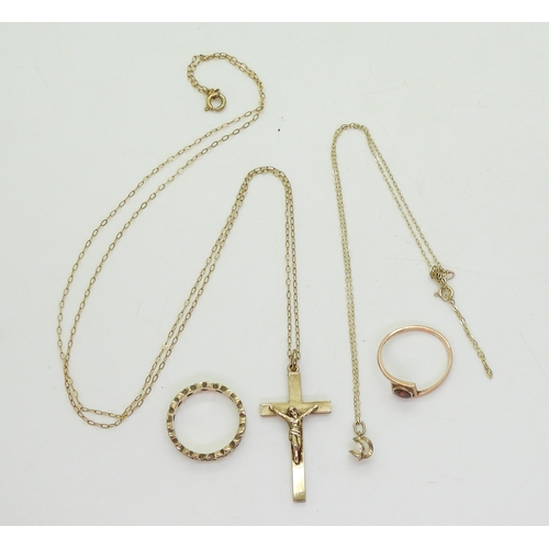 739 - A 9ct gold crucifix and 60cm chain, a pearl pendant and  chain, and a 9ct garnet ring and yellow met... 