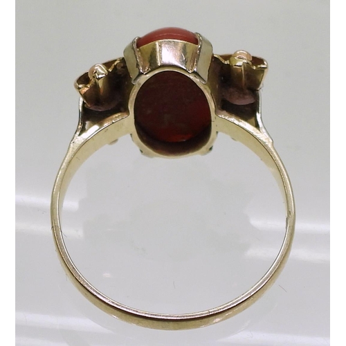 751 - A three colour 14ct gold ring set with a coral, size Q, weight 3.9gms