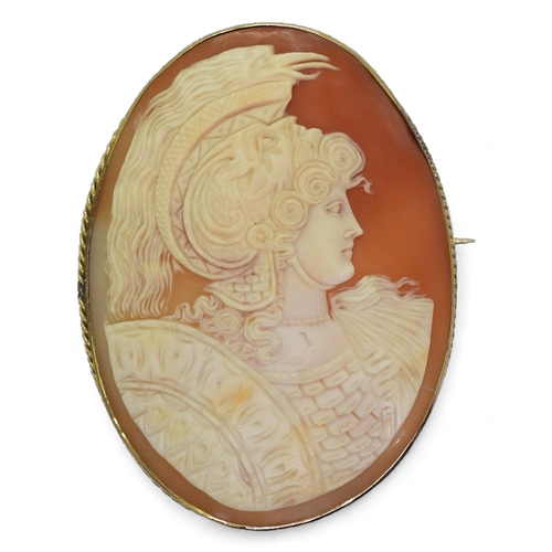 752 - A large well carved shell cameo of a warrior, in a gilded white metal brooch mount, approx 6.2cm x 4... 