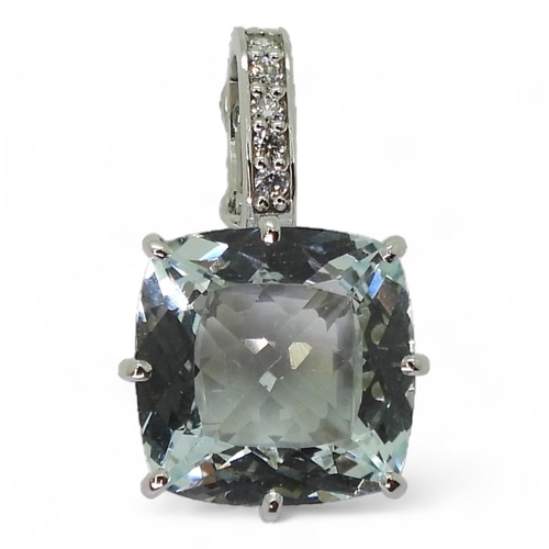 756 - An 18k gold cushion cut aquamarine and diamond pendant, with clip, so could be worn with pearls and ... 