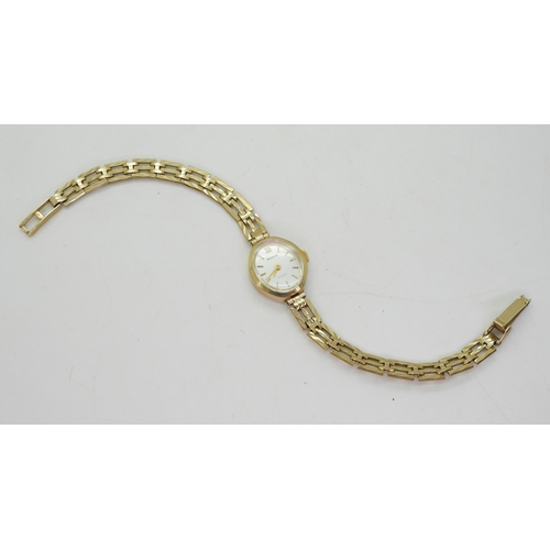 760 - A 9ct gold ladies Accurist watch weight including mechanism 10.6gms