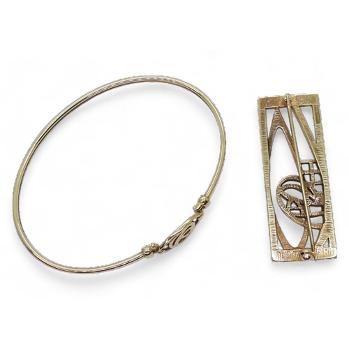 766 - A 9ct gold Mackintosh style, brooch and bangle weight  together 15.1gms