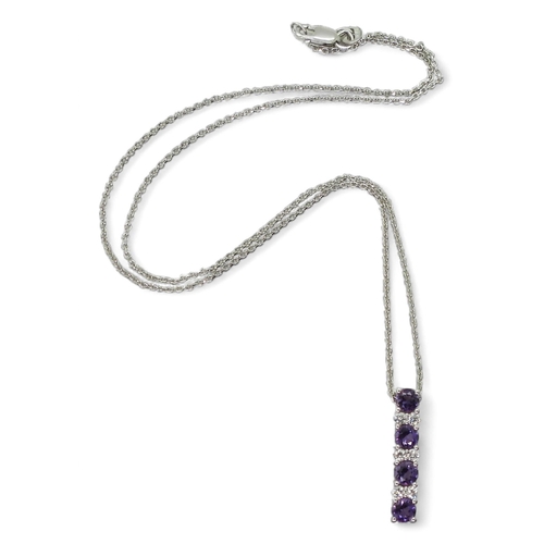 768 - An 18ct white gold amethyst and diamond pendant, set with estimated approx 0.12cts of brilliant cut ... 