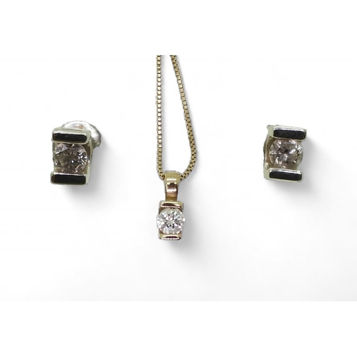 772 - A 9ct yellow gold diamond pendant set with a 0.15ct brilliant cut diamond, together w8ith 9ct white ... 