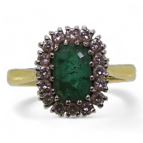 776 - An 18ct gold emerald and diamond cluster ring, set with 0.16cts of brilliant cut diamonds, finger si... 