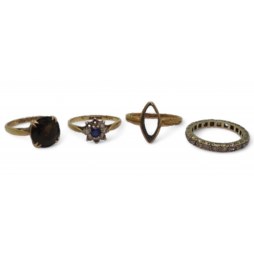 782 - Four 9ct and yellow metal rings, smoky quartz H1/2, eternity ring N, blue and clear gem M, and (af) ... 