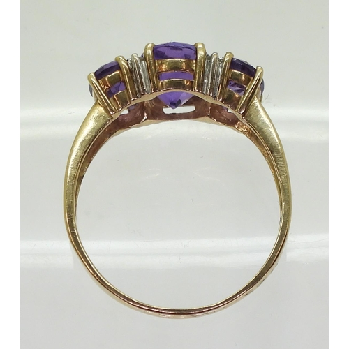 786 - A 9ct gold amethyst and diamond accent ring, size R1/2, weight 3.4gms