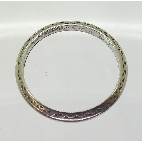 791 - A platinum wedding ring, with engraved pattern, size L, weight 2.5gms