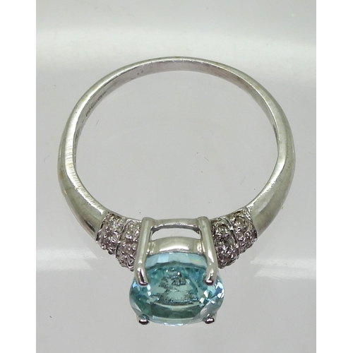 794 - An 18ct white gold topaz and diamond ring, size L, weight 3.1gms