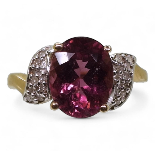 796 - A 9ct gold garnet and diamond ring, size K, weight 2.9gms