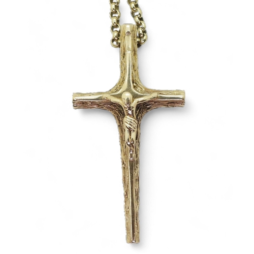 800 - A 9ct gold crucifix pendant, length 4.2cm and 62cm long chain, weight 15.5gms