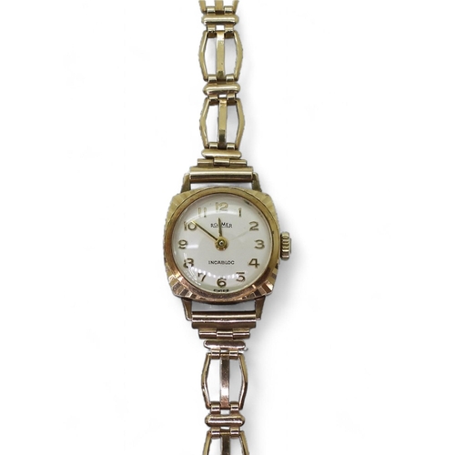 831 - A 9ct gold Roamer ladies watch and strap, weight including mechanism 11.8gms