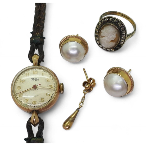 832A - A 9ct gold ladies Majex watch head, together with a pair of 9ct gold mabe pearl earrings a single ye... 