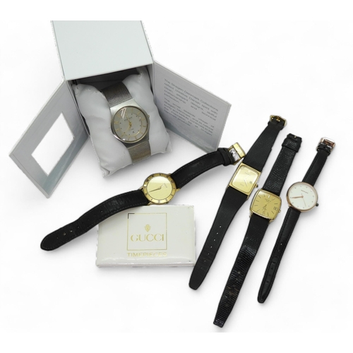 853 - A Gucci wristwatch 300.2.M, together with Skagen watch, including original box and paperwork, with o... 