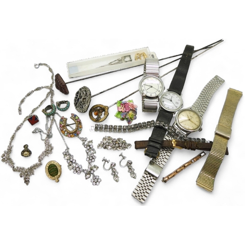 878 - A silver gem set stags head hat pin, made by Adie & Lovekin Ltd, a gents longines watch, a suite... 