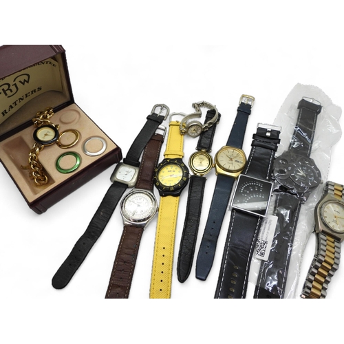 888 - An unusual digital watch, a Swatch stainless steel watch, a Junghans quartz watch and other items