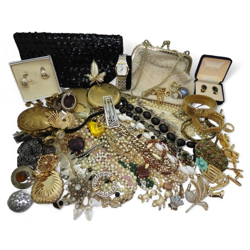 890A - Collection of vintage jewellery, including a heavy gold plated bangle, a Pierre Cardin wristwatch, b... 