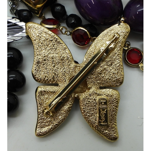 894 - A large quantity of vintage costume jewellery including a butterfly enamel brooch marked Yve Saint L... 