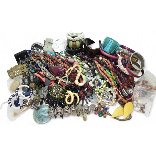 896 - A large quantity of costume jewellery, including multiple beaded necklaces, earrings, brooches and o... 