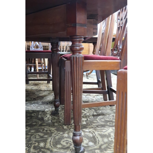 10 - A 19th century mahogany gate legged dining table on turned reeded supports, 68cm high x 178cm long 1... 