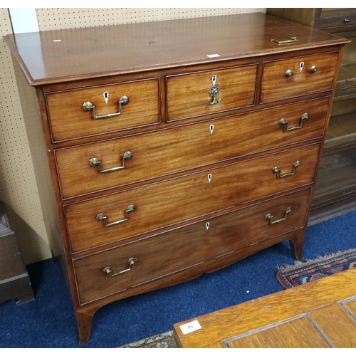 13 - A 19th century mahogany three over three chest of drawers with brass drawer pulls on splayed bracket... 