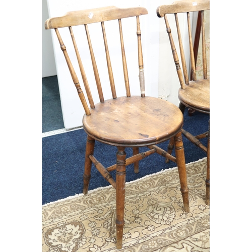 15 - A set of four 20th century Swedish Ibex rail back dining chairs, 84cm high (4) 