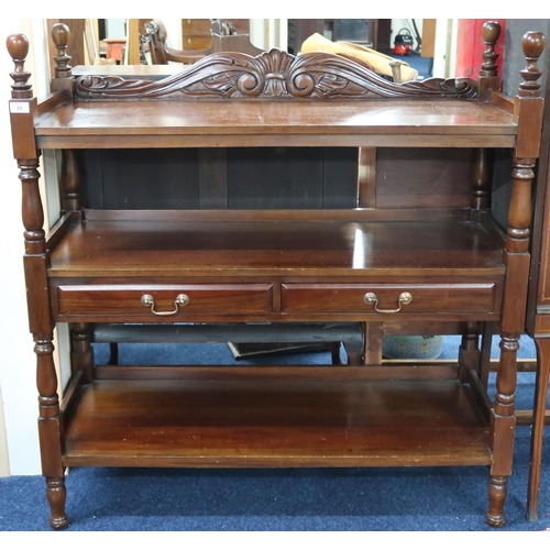 20 - A 20th century mahogany three tier buffet with two drawers to central tier on turned uprights, 115cm... 