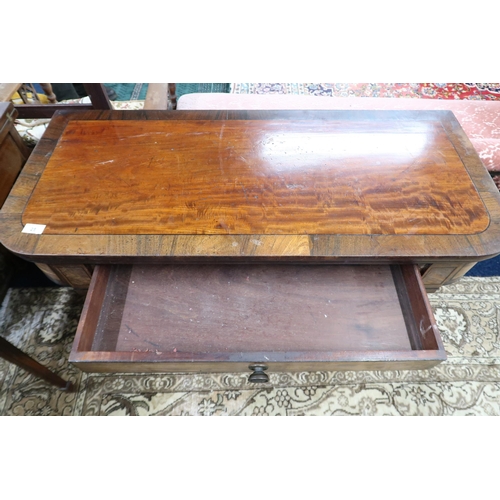 25 - A 19th century mahogany and walnut veneered single drawer fold over tea table on turned supports, 74... 