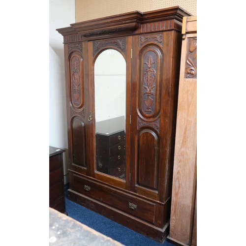 39 - A Victorian mirror doored wardrobe with moulded cornice over bevelled glass mirror door over single ... 