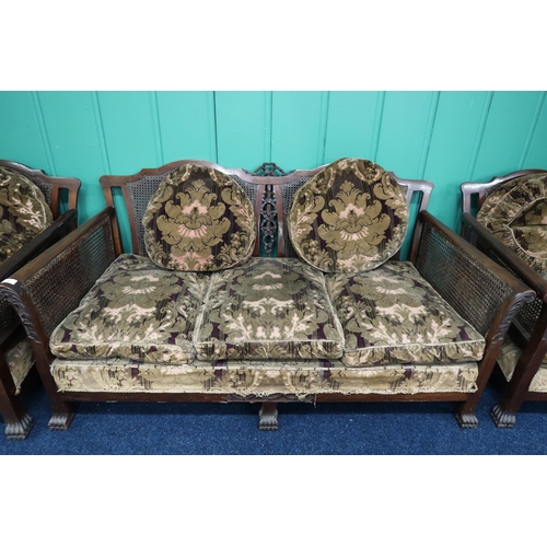 4 - A late Victorian mahogany framed three piece bergere suite with Damask upholstered cushions two seat... 