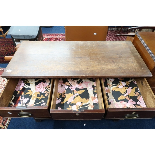 57 - A 19th century mahogany three over three chest of drawers with brass drawer pulls on bracket feet, 9... 