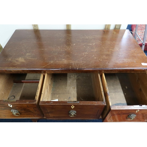 63 - A 19th century mahogany three over three chest of drawers with brass lion masque drawer pulls on spl... 