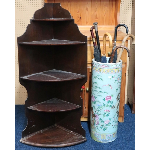 72 - A lot comprising an Oriental style ceramic stick/umbrella stand, assorted sticks/umbrellas and a mah... 