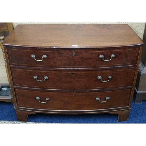 9 - A George III mahogany inlaid bow front three drawer chest with original brass drawer pulls on bracke... 